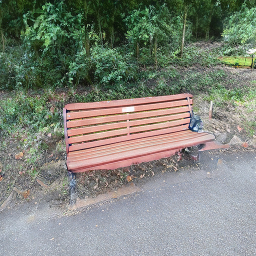 A photograph of a memorial bench which has been generated using artificial intelligence.
