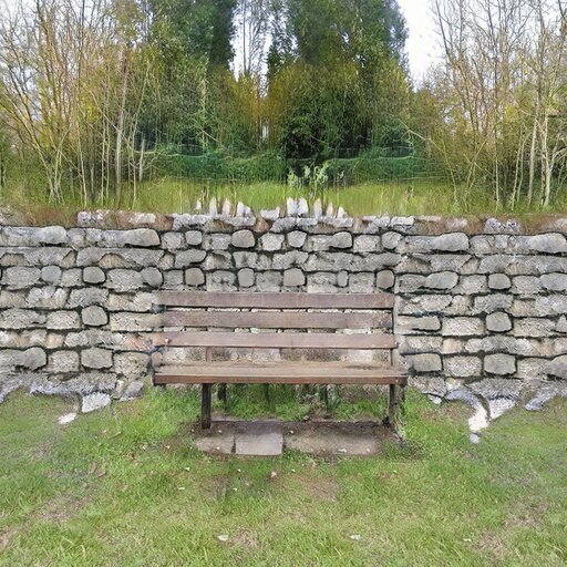 A photograph of a memorial bench which has been generated using artificial intelligence.